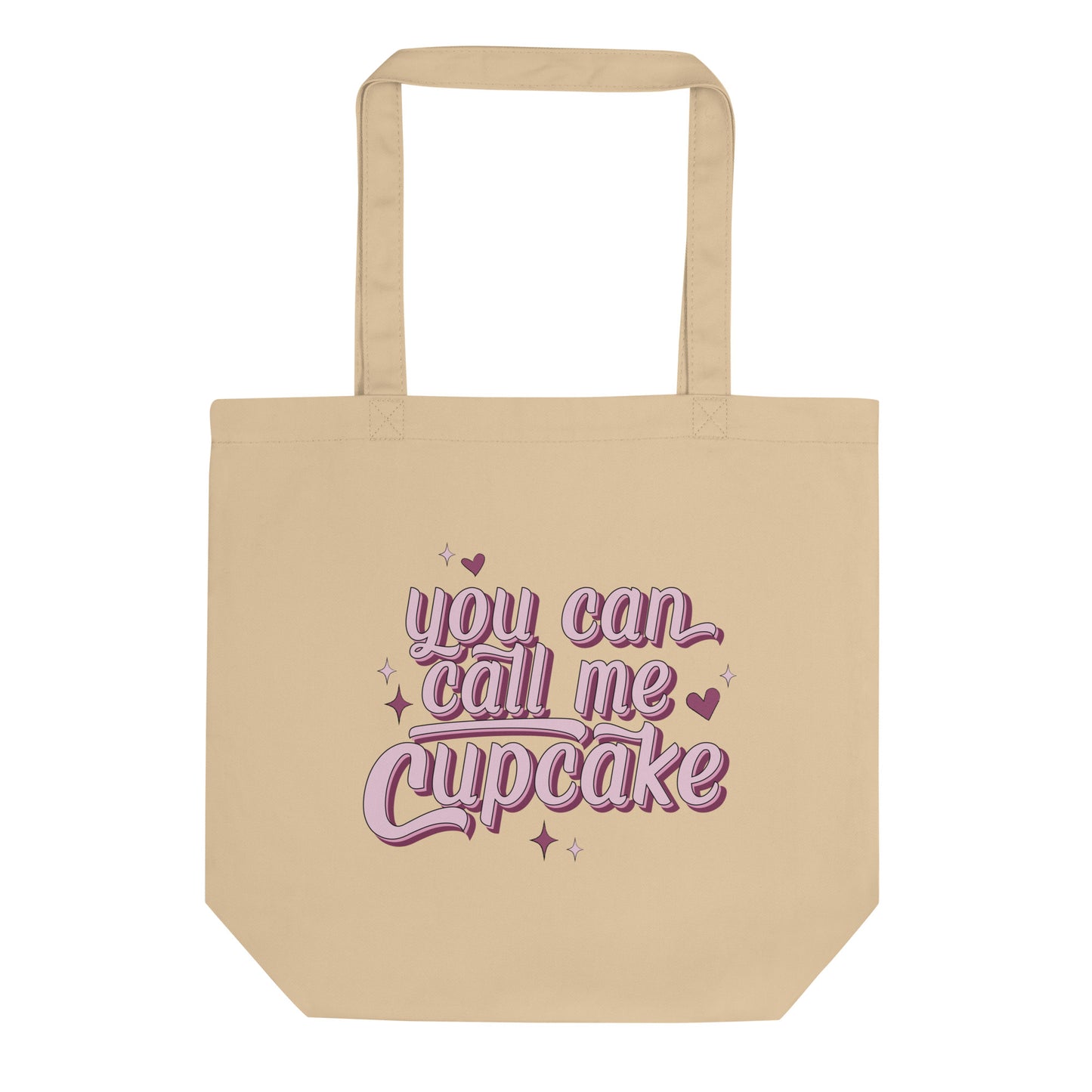 an oyster colored tote bag with large pink lettering that reads "You can Call Me Cupcake" with hearts decorating the words