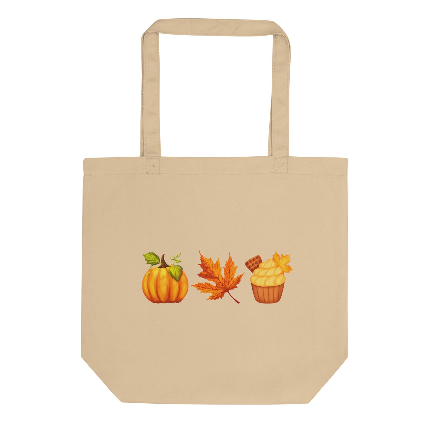 an oyster colored tote bag with a pumpkin, orange leaf and cupcake design