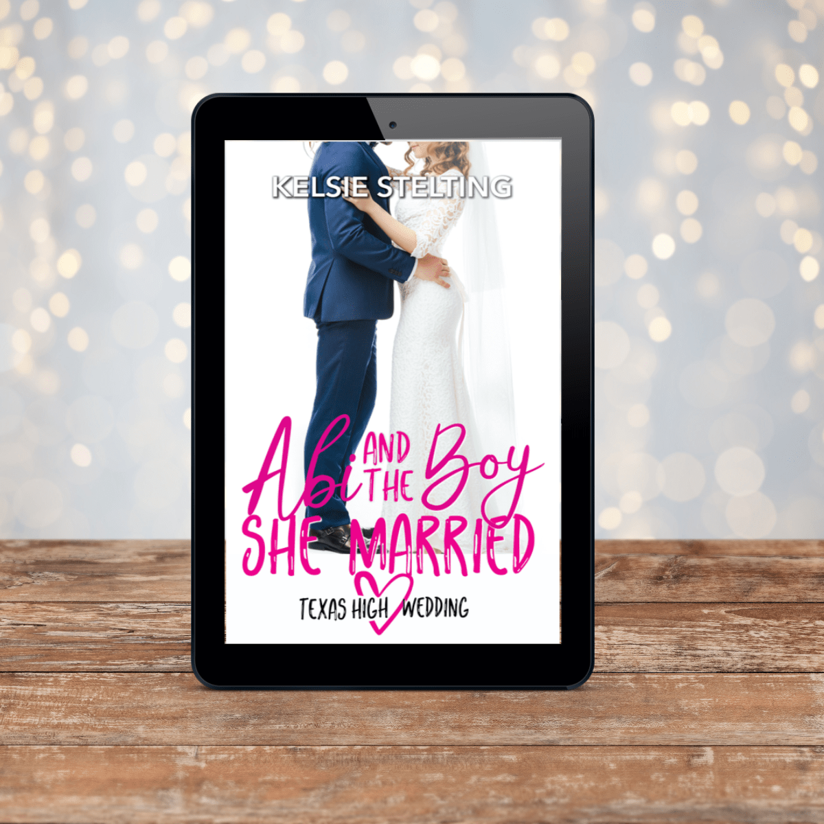 A digital copy of Abi and the Boy She Married by Kelsie Stelting, showing a couple dancing in wedding attire on the cover 