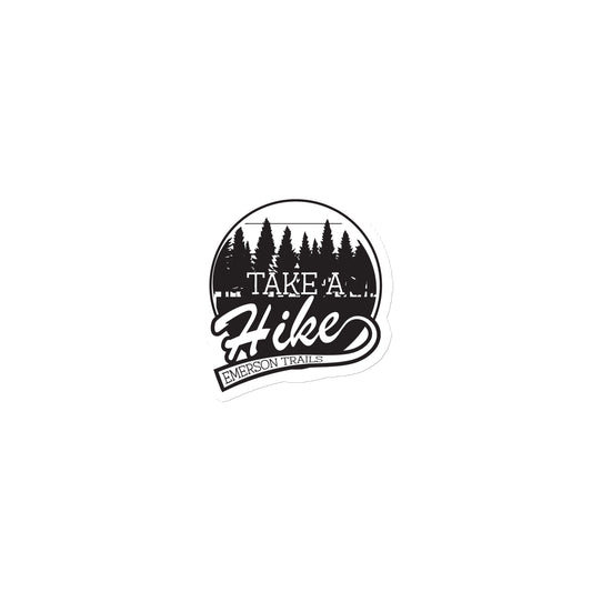 Take A hike, Emerson Trails logo on a magnet with a woods background