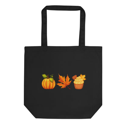 a black tote bag with orange pumpkin, leaf and cupcake design. 