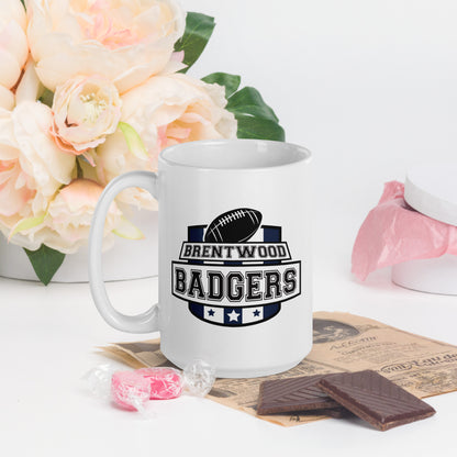 A white mug with a large school crest, showing a football and three stars. The words Brentwood Badgers are printed over the crest 