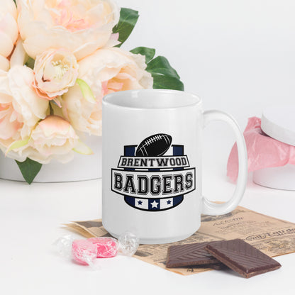 A white mug with a large school crest, showing a football and three stars. The words Brentwood Badgers are printed over the crest 