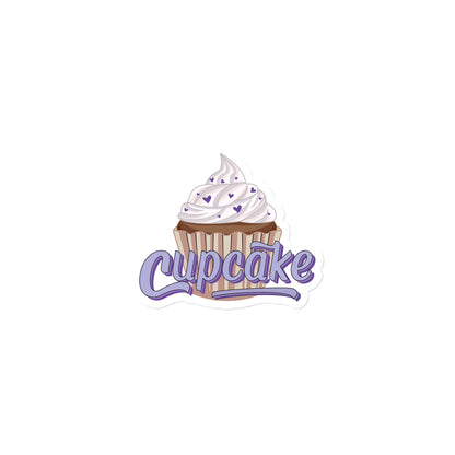 A colorful cupcake magnet with cupcake written across it