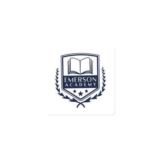A magnet with the Emerson Academy Logo, a school crest that prominently features an open book