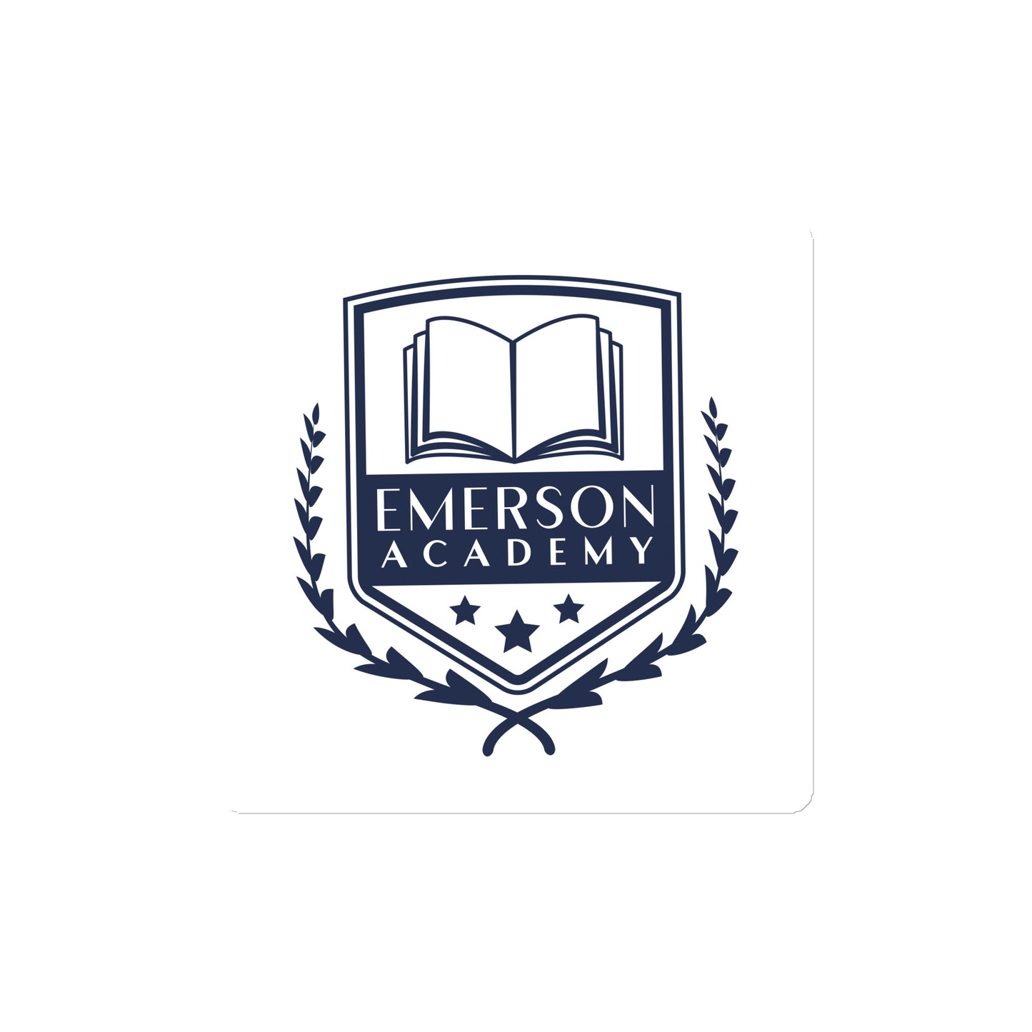 A magnet with the Emerson Academy Logo, a school crest that prominently features an open book