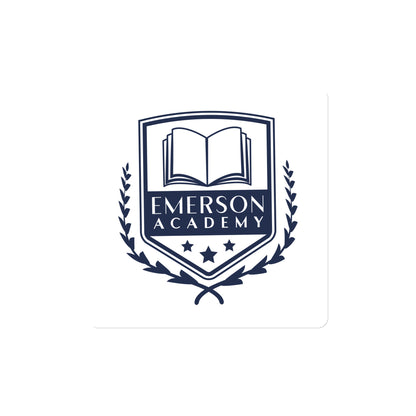 A magnet with the Emerson Academy Logo, a school crest that prominently features an open book