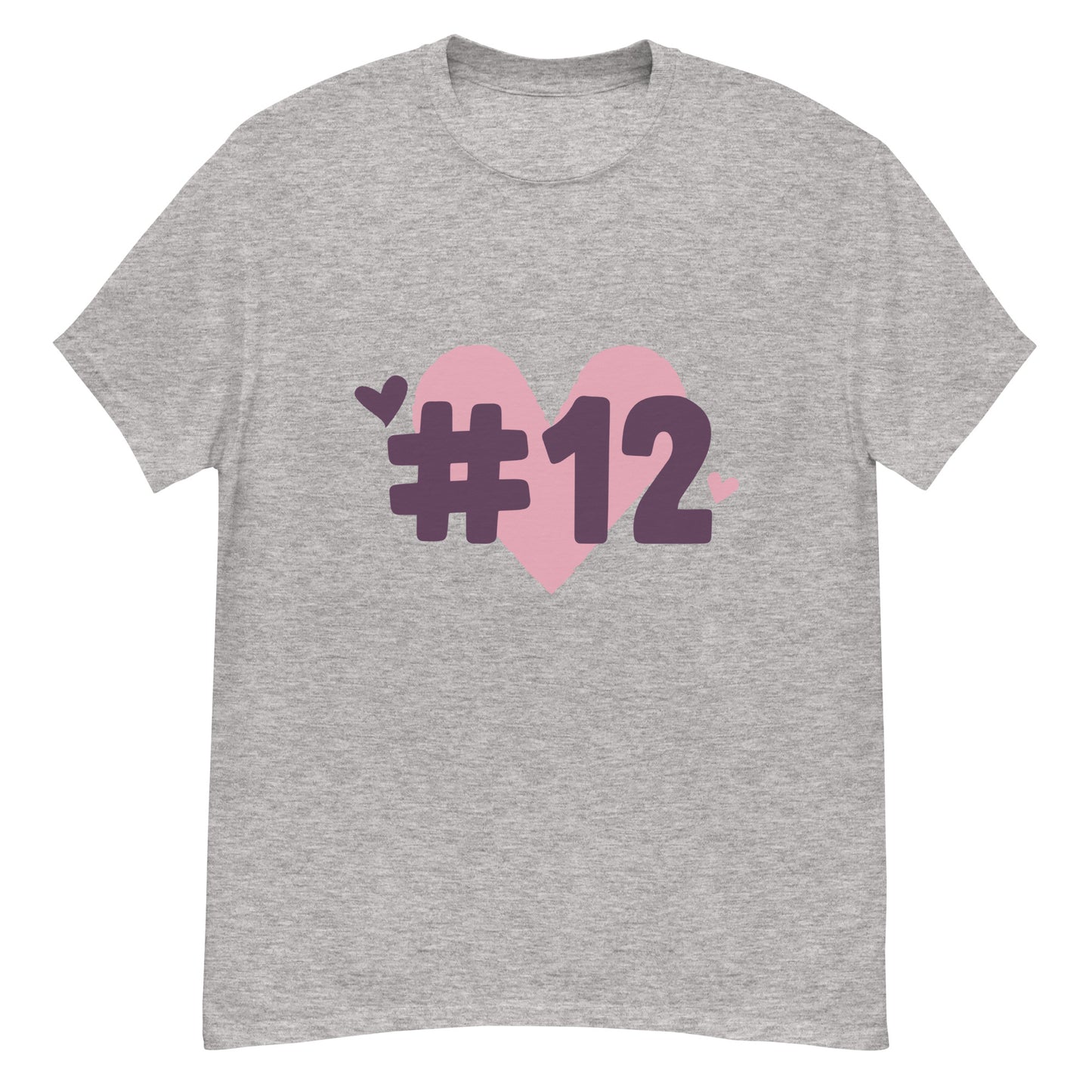 a grey t-shirt with the I Heart #12 Logo. The Number 12 Logo is a large pink heart with #12 in black written over the heart.