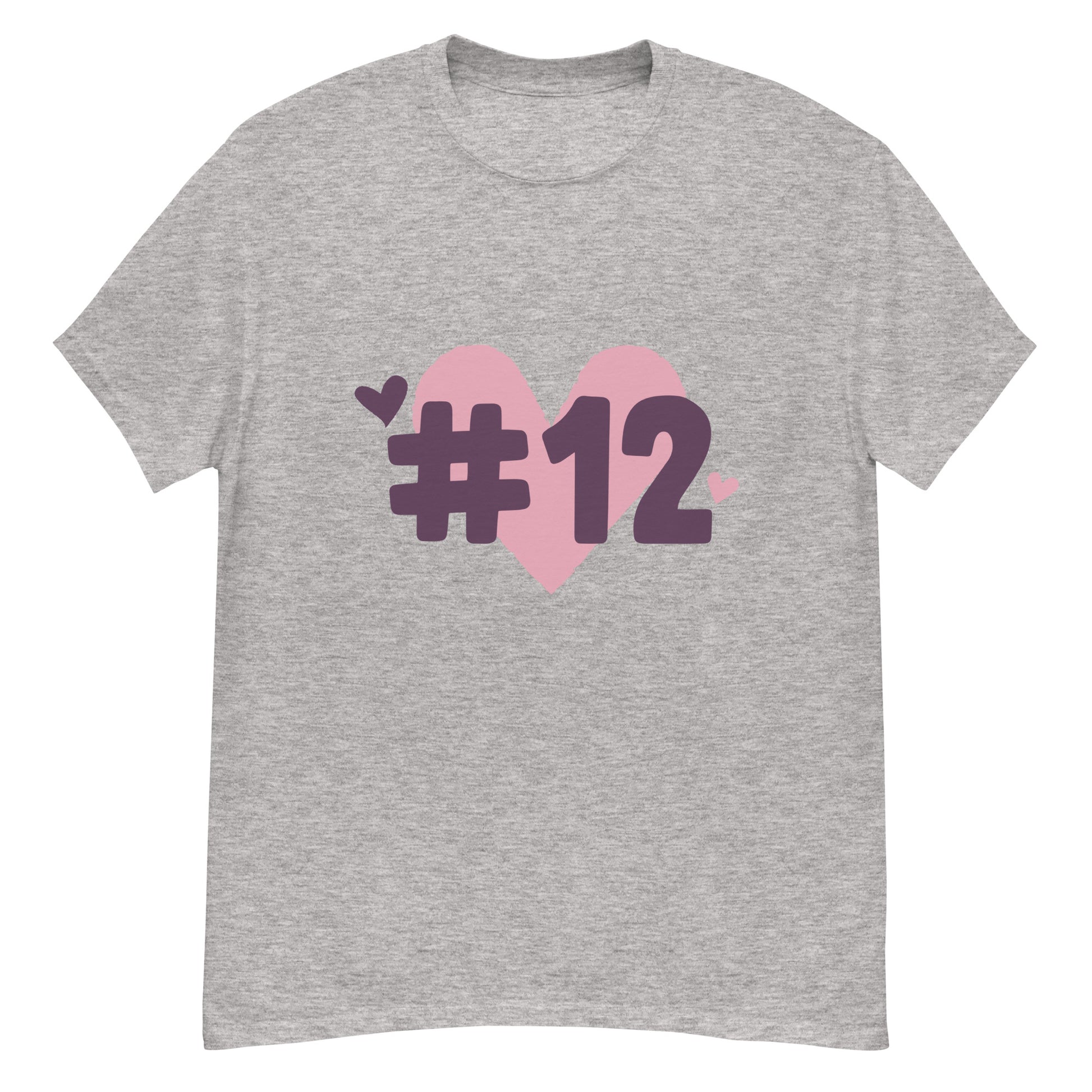 a grey t-shirt with the I Heart #12 Logo. The Number 12 Logo is a large pink heart with #12 in black written over the heart.