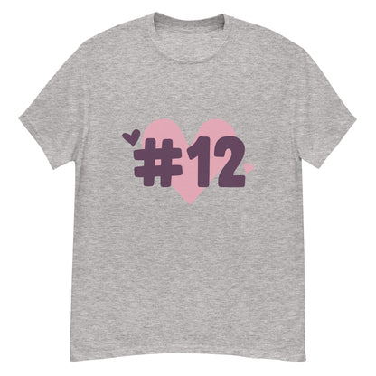 a grey t-shirt with the I Heart #12 Logo. The Number 12 Logo is a large pink heart with #12 in black written over the heart.
