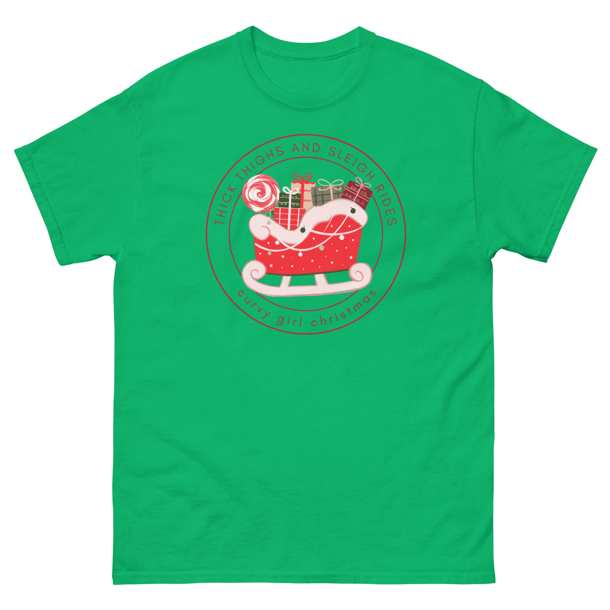 An irish green t-shirt with the Curvy Girl Christmas Sleigh Logo. The logo is a red fluffy sleigh filled with presents, with red lettering circling around that reads Thick Thighs and Sleigh Rides, as well as curvy Girl Christmas