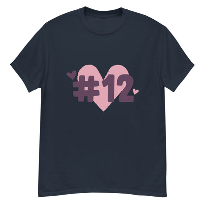 a navy t-shirt with the I Heart #12 Logo. The Number 12 Logo is a large pink heart with #12 in black written over the heart.