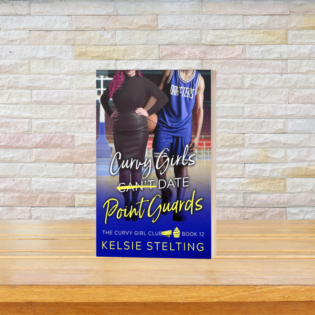 a paperback copy of Curvy Girls Can't Date Point Guards by Kelsie Stelting, The Curvy Girl Club Book 12