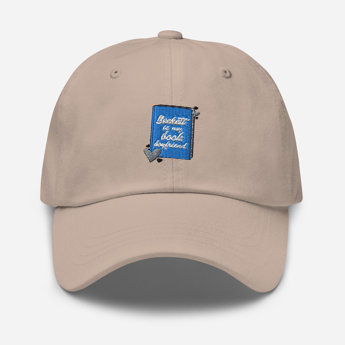 a stone colored with the Beckett logo. The Beckett Logo is a blue book with the words Beckett is my book Boyfriend in cursive, with hearts around the book. 