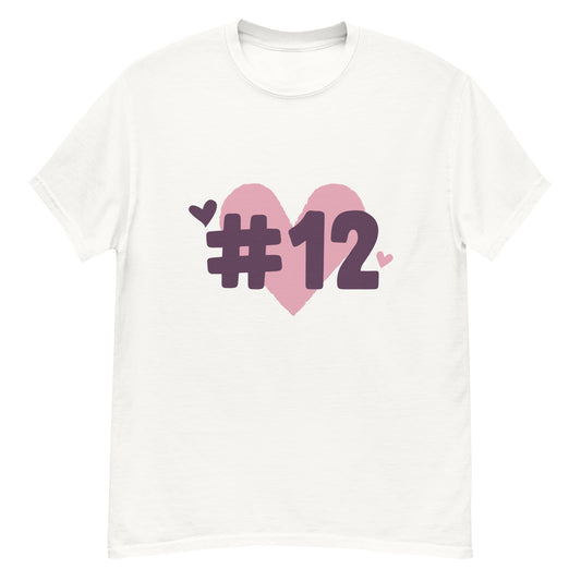 a white t-shirt with the I Heart #12 Logo. The Number 12 Logo is a large pink heart with #12 in black written over the heart.