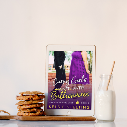 An eBook cover sitting next to milk and cookies. The book's title is Curvy Girls Can't Date Billionaires, The Curvy Girl Club Book 2, by author Kelsie Stelting