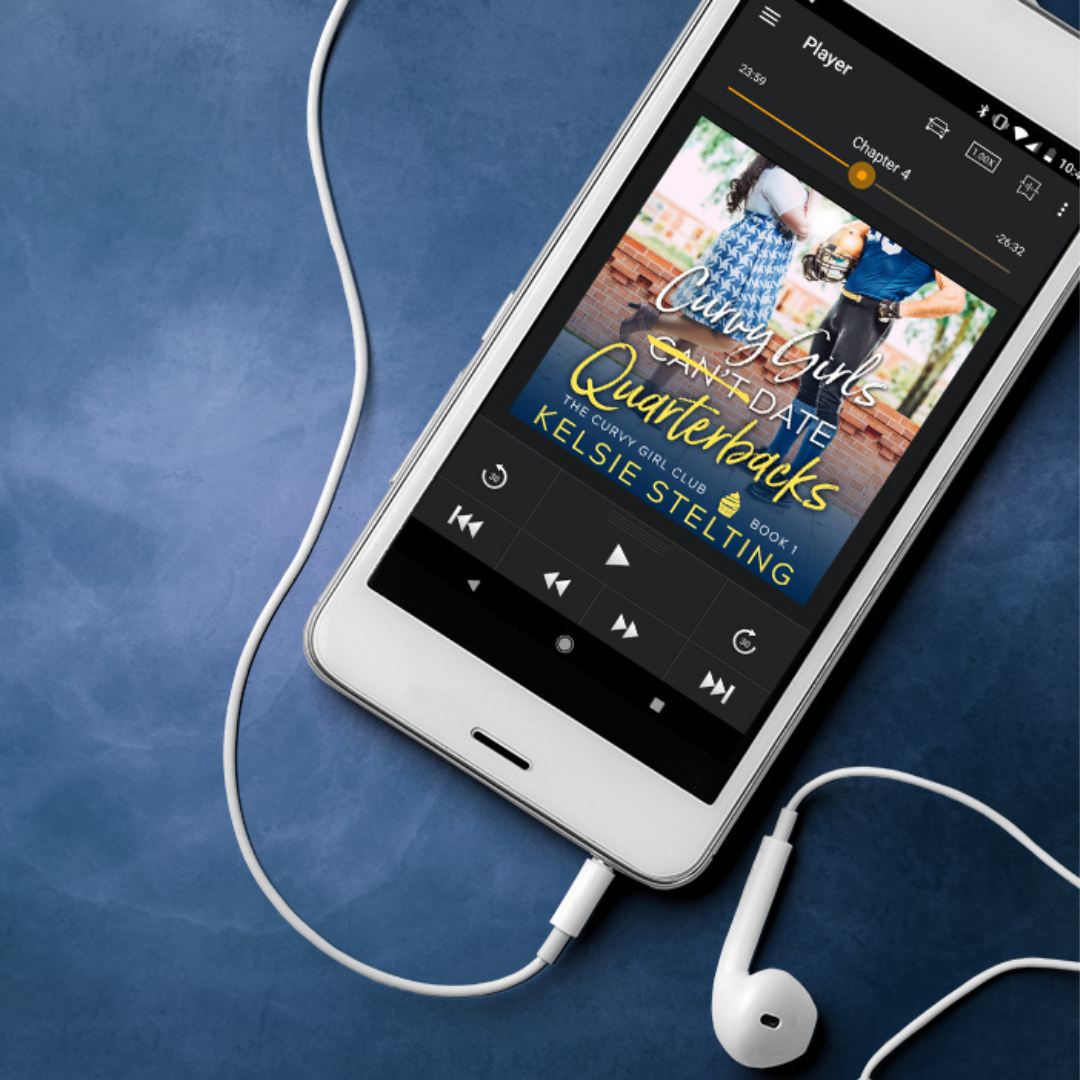 An audiobook player connected to headphones shows a book cover titled "Curvy Girls Can't Date Quarterbacks" The Curvy Girl Club Book 1 
Kelsie Stelting