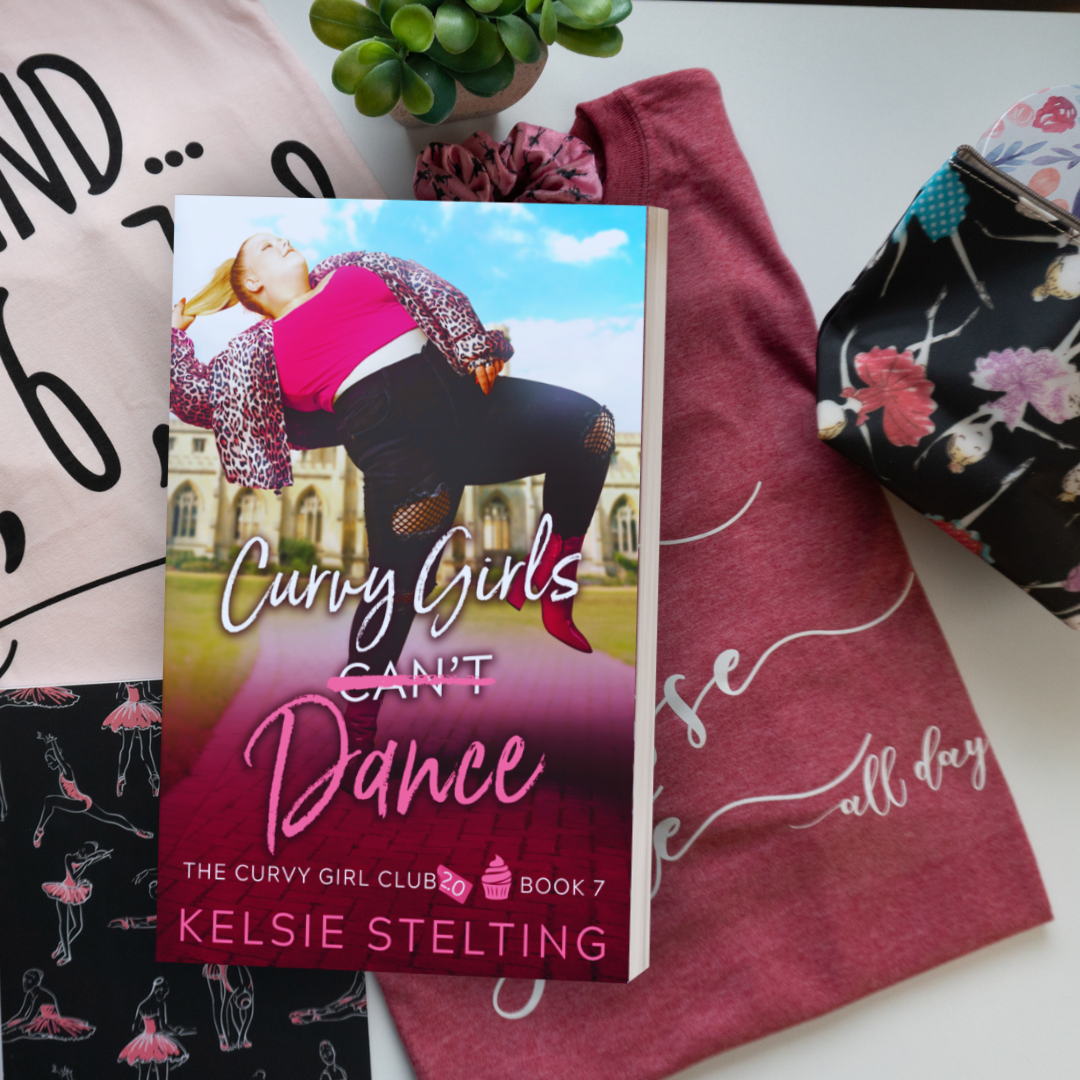A paperback book. The book's title is Curvy Girls Can't Dance, The Curvy Girl Club Book 7 by author Kelsie Stelting